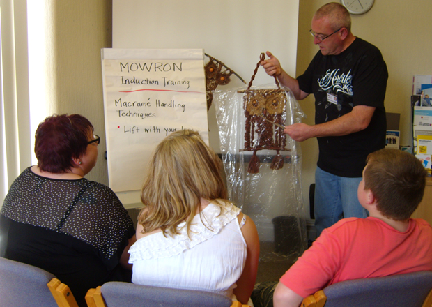 Greg demonstrates macrame handling techniques